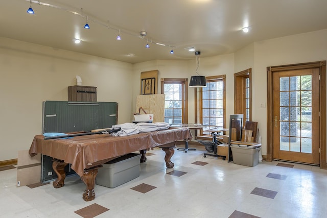 playroom with pool table, a healthy amount of sunlight, and tile patterned floors