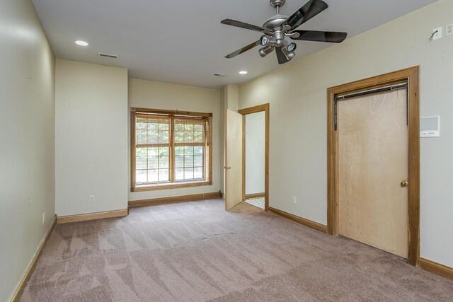 unfurnished bedroom featuring carpet floors, recessed lighting, and baseboards