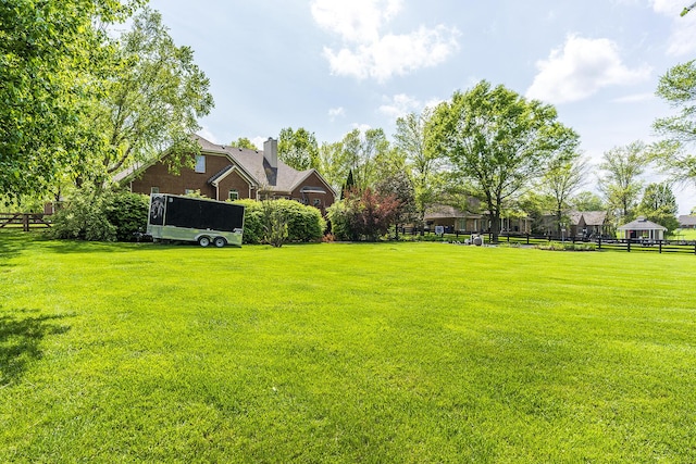view of yard featuring fence