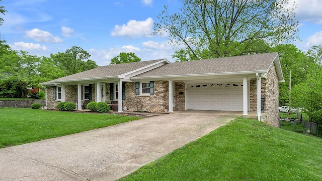 525 Hiawatha Trl, Frankfort, KY 40601 - ranch-style home with a garage, driveway, a front lawn, and stone siding