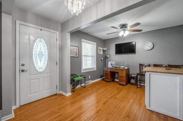 525 Hiawatha Trl, Frankfort, KY 40601 - entrance foyer featuring light wood-style flooring, ceiling fan, a chandelier, and baseboards