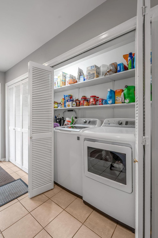 525 Hiawatha Trl, Frankfort, KY 40601 - laundry area with independent washer and dryer and light tile patterned flooring