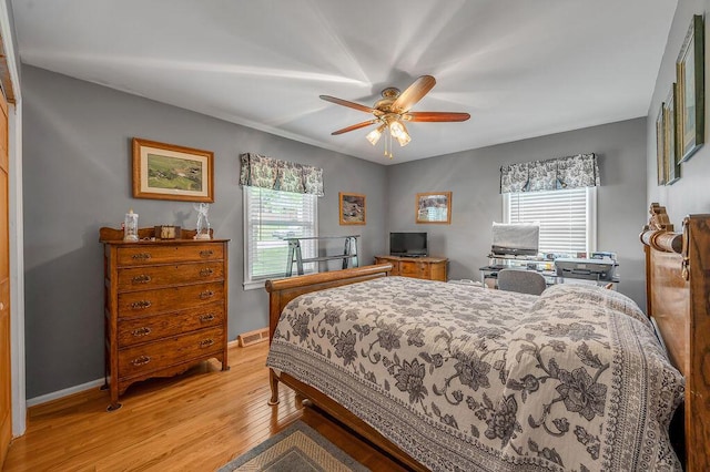 525 Hiawatha Trl, Frankfort, KY 40601 - bedroom with light wood-type flooring, baseboards, and a ceiling fan