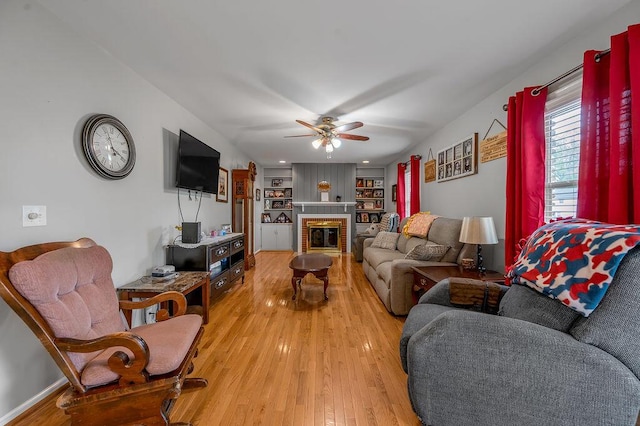 525 Hiawatha Trl, Frankfort, KY 40601 - kitchen with freestanding refrigerator, light tile patterned floors, a ceiling fan, tasteful backsplash, and brown cabinets