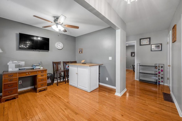 525 Hiawatha Trl, Frankfort, KY 40601 - home office featuring a ceiling fan, light wood finished floors, and baseboards