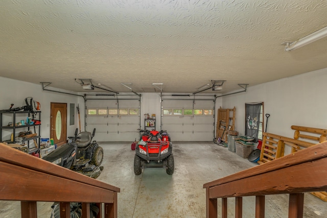 garage featuring electric panel and a garage door opener