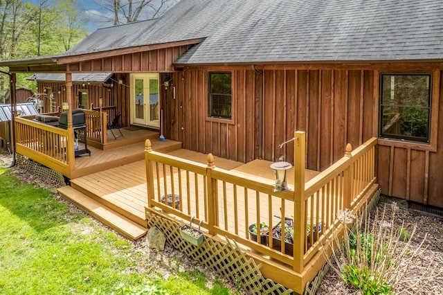 wooden deck featuring french doors