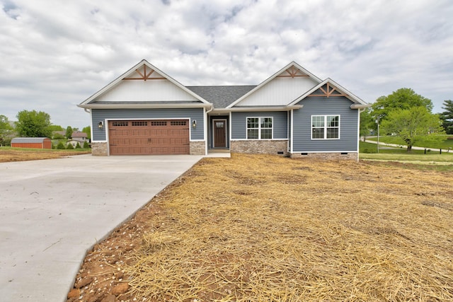 craftsman house with a garage, driveway, roof with shingles, and crawl space