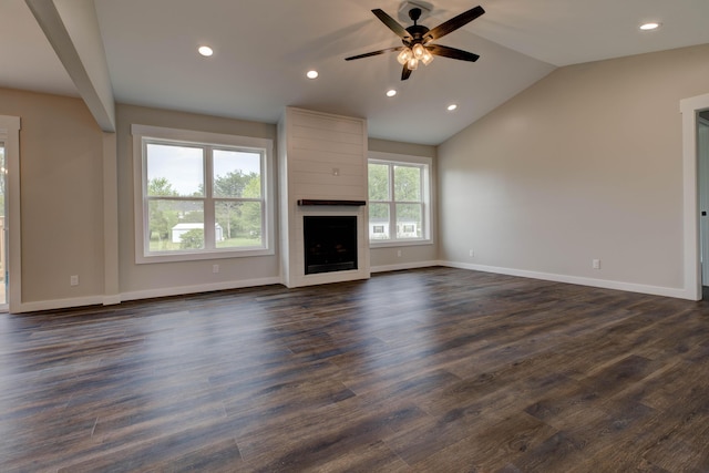 unfurnished living room with a ceiling fan, a fireplace, baseboards, lofted ceiling, and recessed lighting