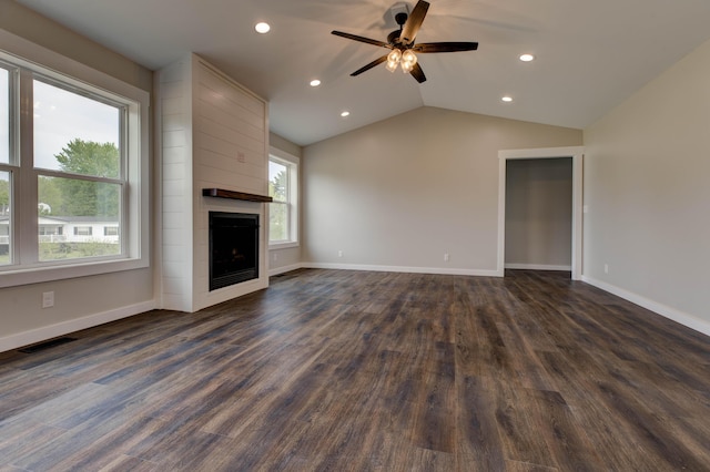 unfurnished living room with a ceiling fan, dark wood-style flooring, visible vents, a large fireplace, and recessed lighting