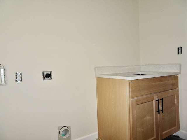 4165 Meadowlark Ln, Lexington, KY 40509 - laundry room featuring baseboards