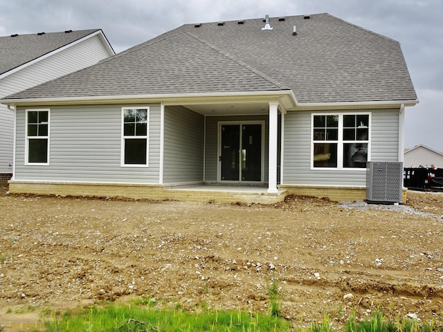 4165 Meadowlark Ln, Lexington, KY 40509 - back of property featuring a shingled roof and a patio