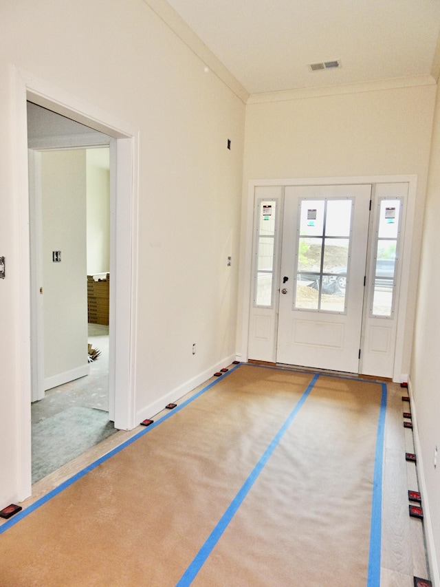 4165 Meadowlark Ln, Lexington, KY 40509 - entryway featuring carpet, baseboards, and crown molding