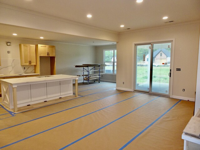 4165 Meadowlark Ln, Lexington, KY 40509 - kitchen with baseboards, ornamental molding, recessed lighting, light countertops, and a center island