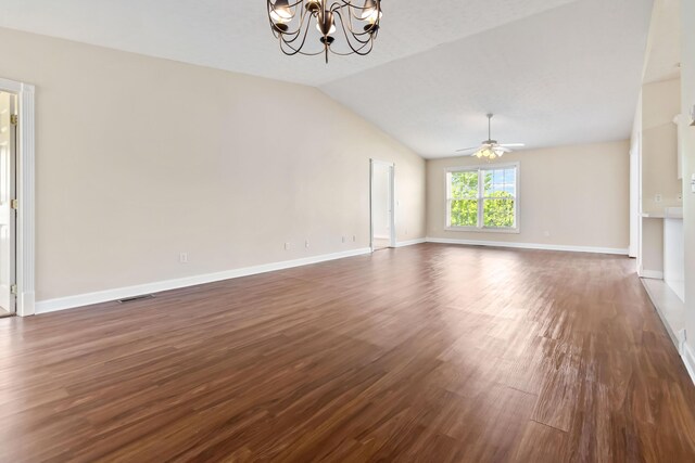 unfurnished living room with visible vents, dark wood finished floors, and ceiling fan with notable chandelier
