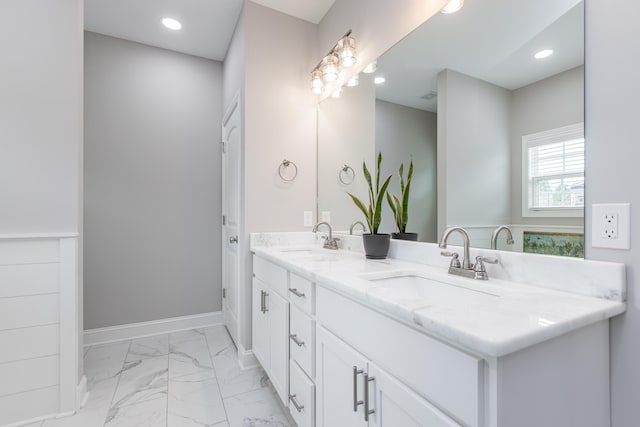 1035 Vineyard Way, Berea, KY 40403 - bathroom featuring marble finish floors, double vanity, recessed lighting, and baseboards