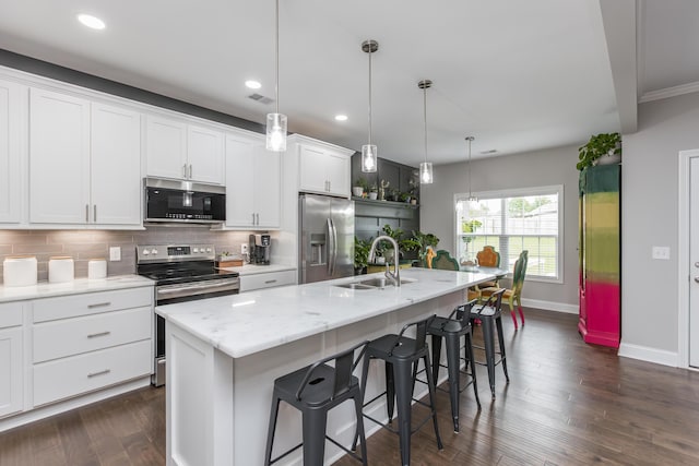 1035 Vineyard Way, Berea, KY 40403 - kitchen featuring stainless steel appliances, a sink, baseboards, dark wood-style flooring, and decorative backsplash