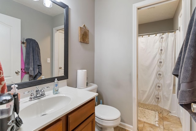 full bathroom with toilet, curtained shower, tile patterned flooring, and vanity