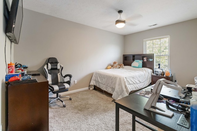 bedroom featuring baseboards, carpet, and visible vents