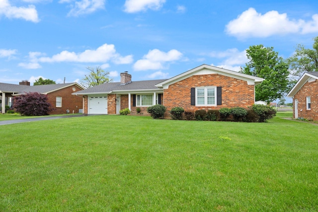 136 Pin Oak Dr, Lancaster, KY 40444 - ranch-style house with an attached garage, brick siding, a chimney, and aphalt driveway