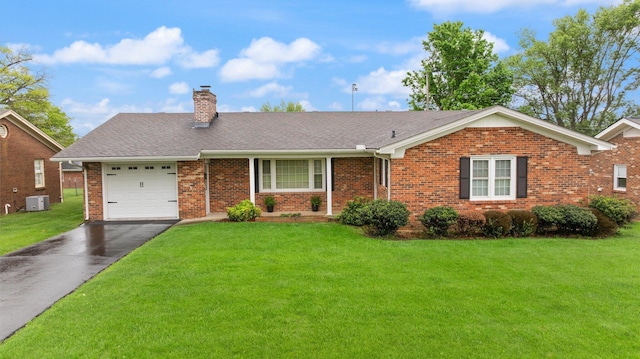 136 Pin Oak Dr, Lancaster, KY 40444 - single story home featuring a chimney, driveway, brick siding, a garage, and a front lawn