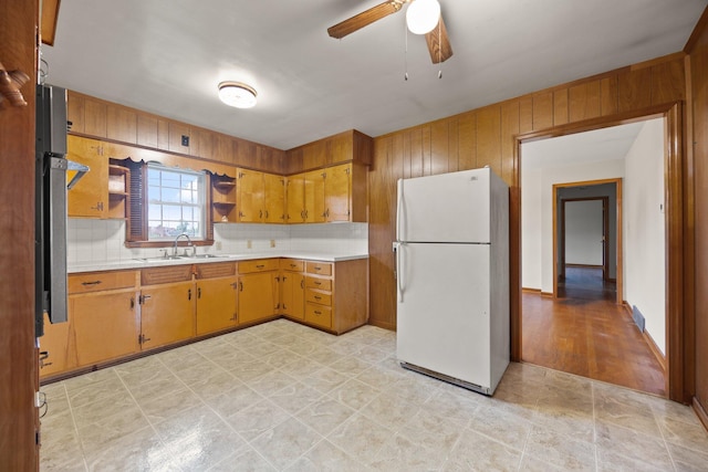 136 Pin Oak Dr, Lancaster, KY 40444 - kitchen with freestanding refrigerator, light countertops, decorative backsplash, and a sink