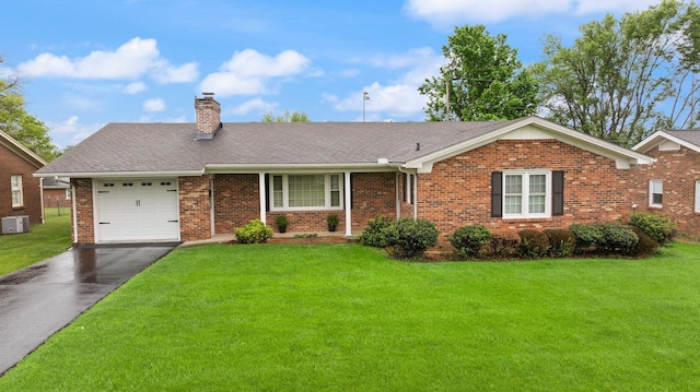 136 Pin Oak Dr, Lancaster, KY 40444 - ranch-style house featuring aphalt driveway, brick siding, a garage, a front lawn, and a chimney