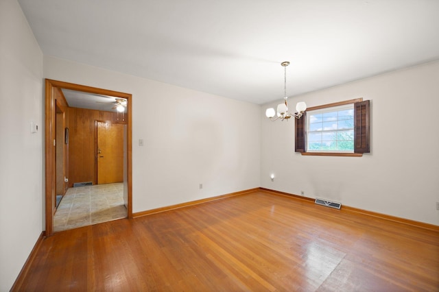 136 Pin Oak Dr, Lancaster, KY 40444 - empty room featuring baseboards, a chandelier, visible vents, and wood finished floors