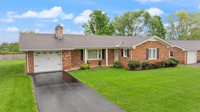 136 Pin Oak Dr, Lancaster, KY 40444 - ranch-style house featuring a chimney, driveway, brick siding, an attached garage, and a front yard