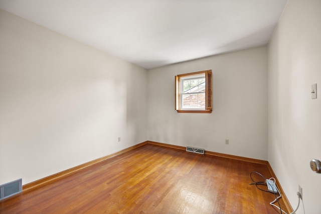 136 Pin Oak Dr, Lancaster, KY 40444 - spare room featuring visible vents, wood finished floors, and baseboards