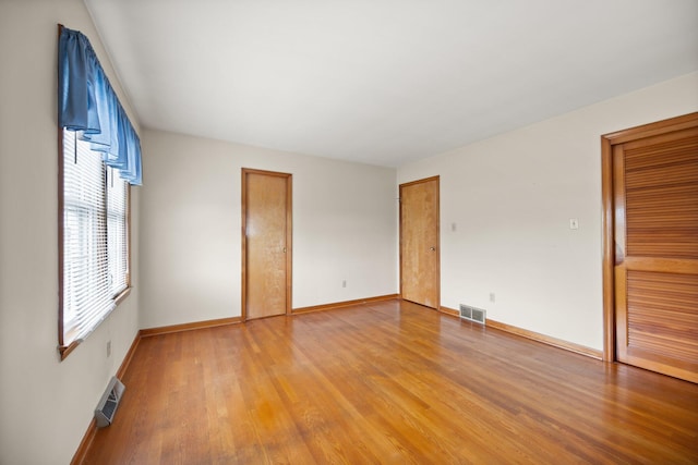 136 Pin Oak Dr, Lancaster, KY 40444 - unfurnished room with baseboards, light wood-style flooring, and visible vents