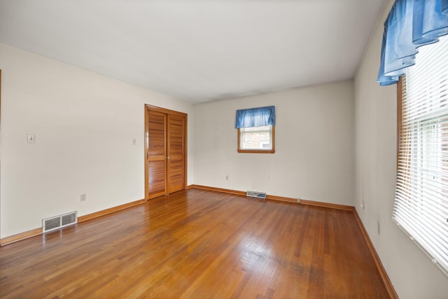 136 Pin Oak Dr, Lancaster, KY 40444 - unfurnished room featuring visible vents, wood finished floors, and baseboards
