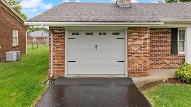 136 Pin Oak Dr, Lancaster, KY 40444 - garage featuring driveway and central AC