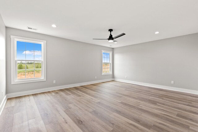563 Middle Creek Way, Berea, KY 40403 - unfurnished room with baseboards, a ceiling fan, light wood-style flooring, and visible vents