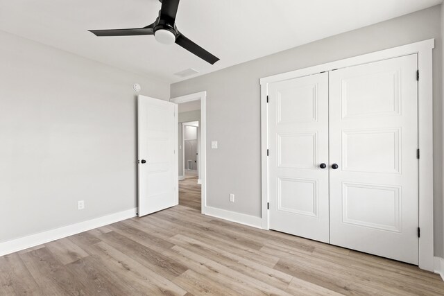 563 Middle Creek Way, Berea, KY 40403 - unfurnished bedroom with a ceiling fan, visible vents, baseboards, a closet, and light wood finished floors