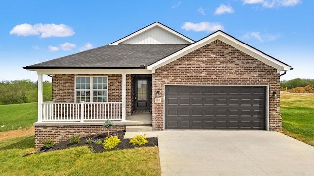 ranch-style home with a shingled roof, an attached garage, brick siding, covered porch, and driveway