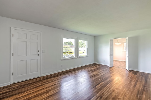 114 Cave Springs Dr, Lancaster, KY 40444 - interior space featuring baseboards and dark wood-style flooring