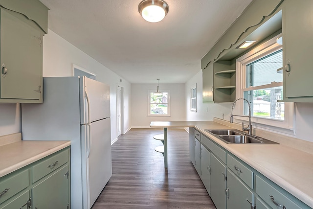 114 Cave Springs Dr, Lancaster, KY 40444 - kitchen with a sink, green cabinetry, dark wood-style floors, and light countertops