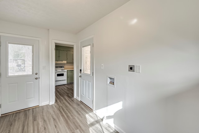 114 Cave Springs Dr, Lancaster, KY 40444 - laundry area featuring laundry area, baseboards, hookup for a washing machine, electric dryer hookup, and light wood-style flooring