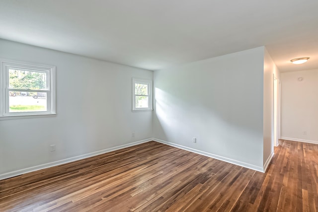 114 Cave Springs Dr, Lancaster, KY 40444 - unfurnished room with baseboards and dark wood-style floors