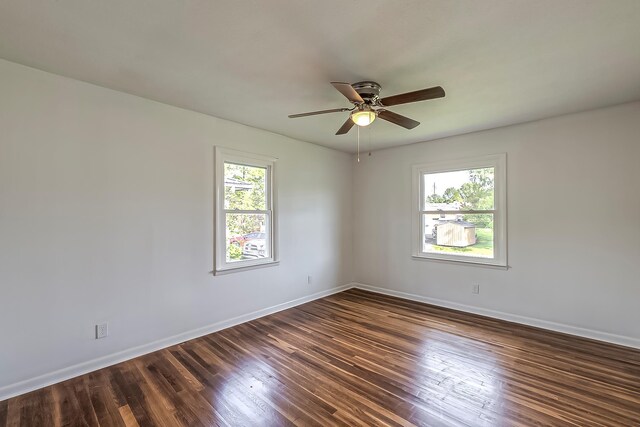 114 Cave Springs Dr, Lancaster, KY 40444 - spare room with a ceiling fan, baseboards, and dark wood-style floors