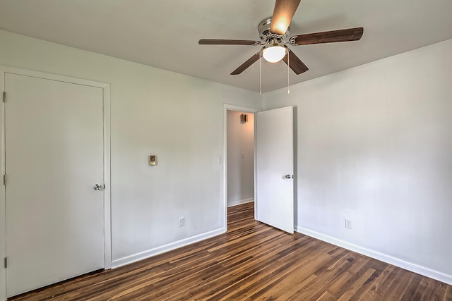114 Cave Springs Dr, Lancaster, KY 40444 - unfurnished bedroom with baseboards, ceiling fan, and dark wood-style floors