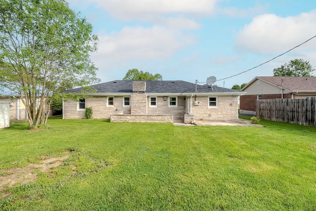 114 Cave Springs Dr, Lancaster, KY 40444 - rear view of house with fence, a lawn, a patio area, and stone siding