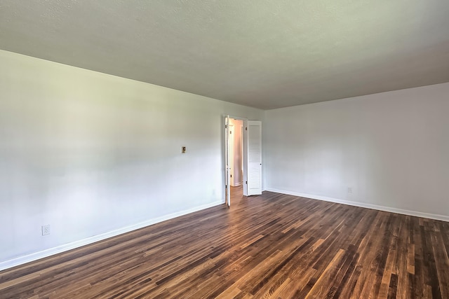 114 Cave Springs Dr, Lancaster, KY 40444 - empty room with baseboards and dark wood-style floors