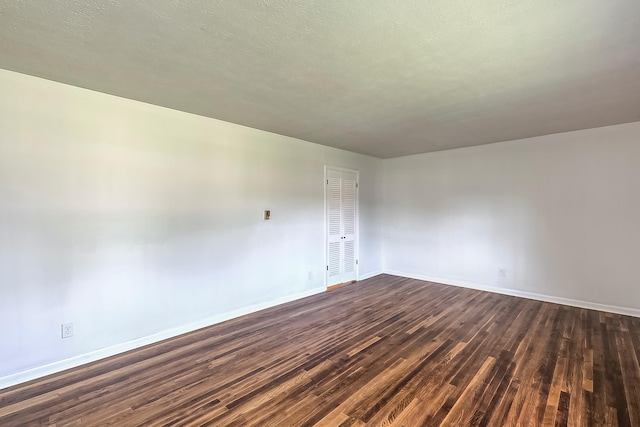 114 Cave Springs Dr, Lancaster, KY 40444 - unfurnished room featuring baseboards and dark wood-style flooring