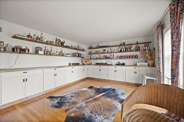 500 Curdsville Rd, Harrodsburg, KY 40330 - kitchen with open shelves, a wealth of natural light, and light wood-style flooring