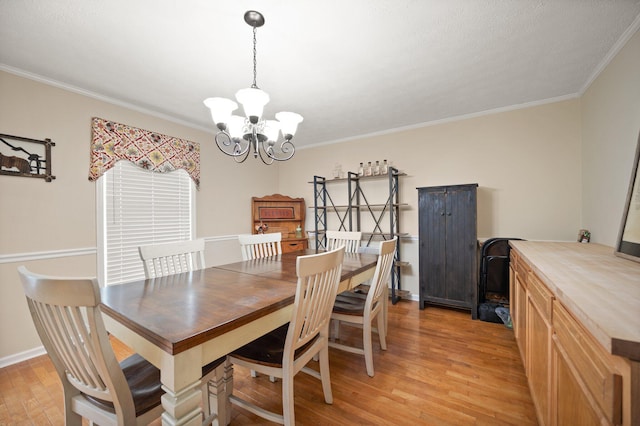 500 Curdsville Rd, Harrodsburg, KY 40330 - dining space with light wood-style floors, baseboards, ornamental molding, and a notable chandelier