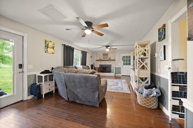 500 Curdsville Rd, Harrodsburg, KY 40330 - living room with a fireplace, ceiling fan, hardwood / wood-style flooring, and visible vents