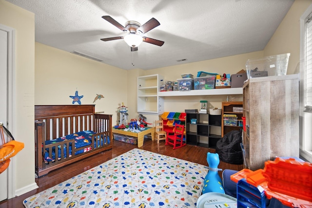 500 Curdsville Rd, Harrodsburg, KY 40330 - bedroom with ceiling fan, visible vents, a textured ceiling, and wood finished floors