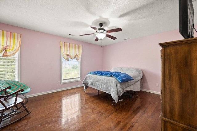 500 Curdsville Rd, Harrodsburg, KY 40330 - bedroom with wood-type flooring, baseboards, a ceiling fan, and visible vents